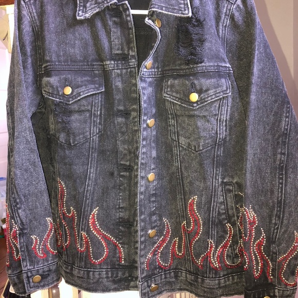 black jean jacket with flames